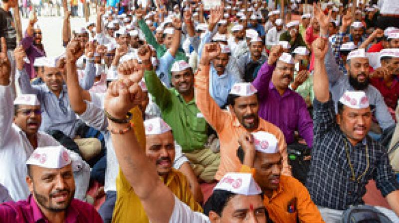 Maharashtra: State employees on strike demanding restoration of old pension scheme