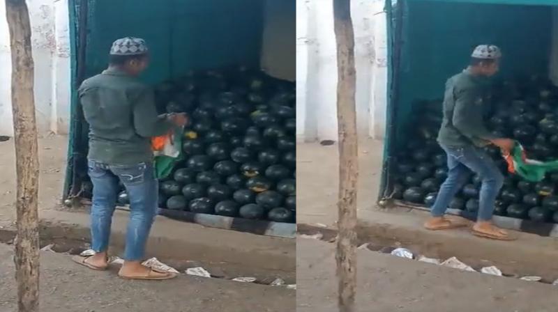 Tricolor insulted in UP, man seen cleaning watermelon with flag! you also see