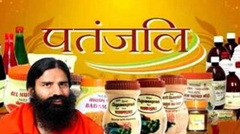 BSE, NSE freeze shares of Patanjali Foods promoters