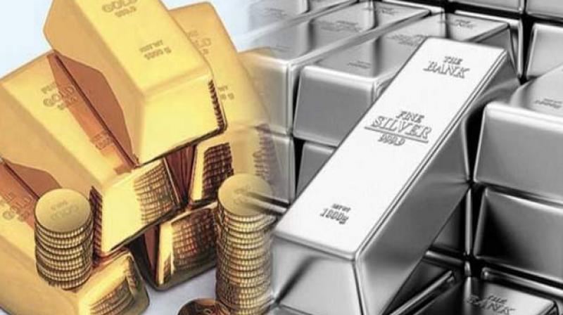 Gold down by Rs 574 on weak global trend, silver down by Rs 2,113