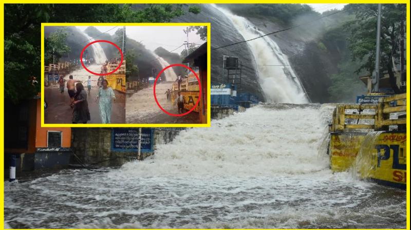 Courtallam waterfall Ban for bathing, young boy missing in flood news in hindi