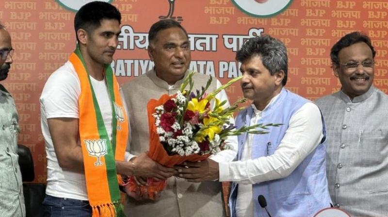 Boxer Vijender Singh left Congress and joined BJP news in hindi