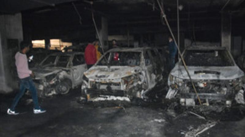 Fire breaks out in West Delhi's multi-storey parking area, 21 cars gutted