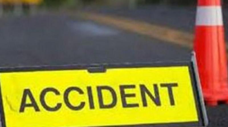 Truck hits motorcycle, woman dies