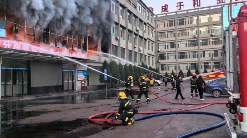 China Fire News Fire at coal mining company offices kills 26 people in China