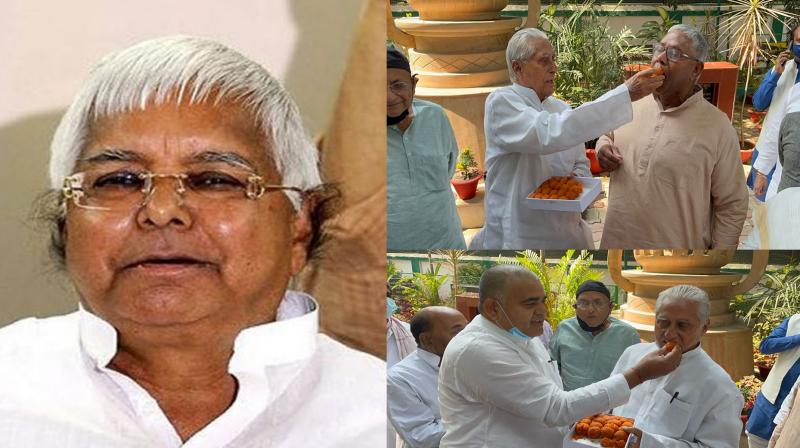 RJD leaders expressed happiness by feeding each other sweets after Lalu family got bail